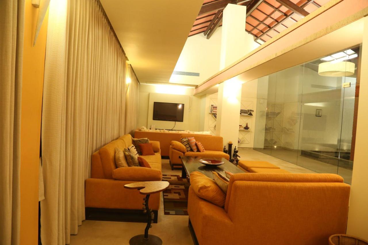 เอาท์โพสท์ แอท อาลิบัก รีสอร์ต Hotel อลีบาก ภายนอก รูปภาพ